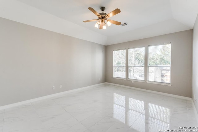 spare room featuring ceiling fan