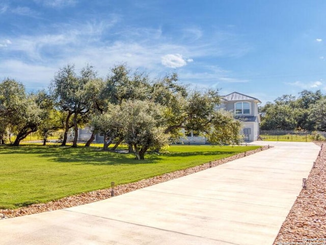 795 Maximino Ridge Rd, Bulverde, TX 78163 - view of home's community with concrete driveway and a yard