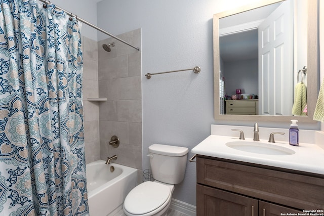 full bathroom with vanity, toilet, and shower / bath combo with shower curtain