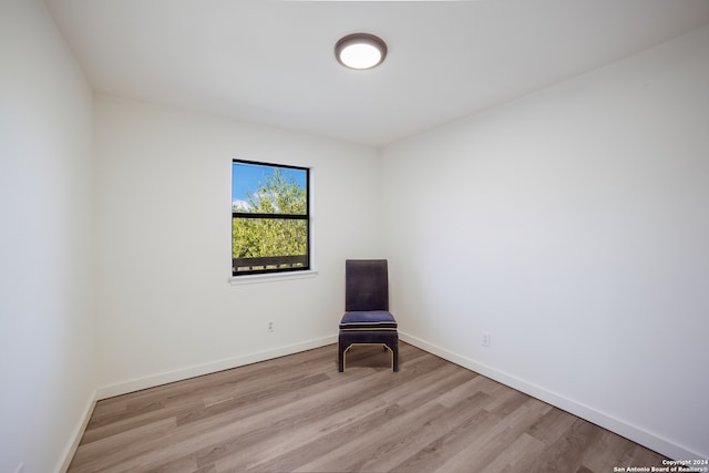 unfurnished room featuring light hardwood / wood-style flooring