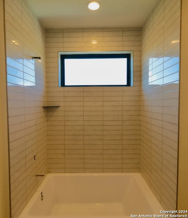10899 S Hausman Rd Unit 204, San Antonio, TX 78249 - bathroom with tile patterned floors, a tub, and vanity