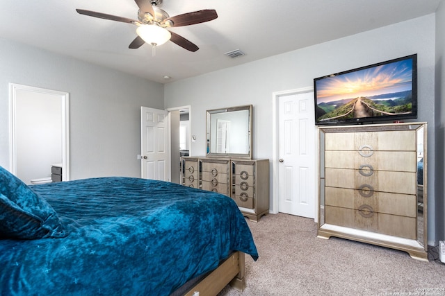 bedroom featuring ceiling fan and carpet floors