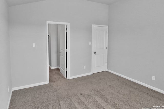 unfurnished room with carpet floors