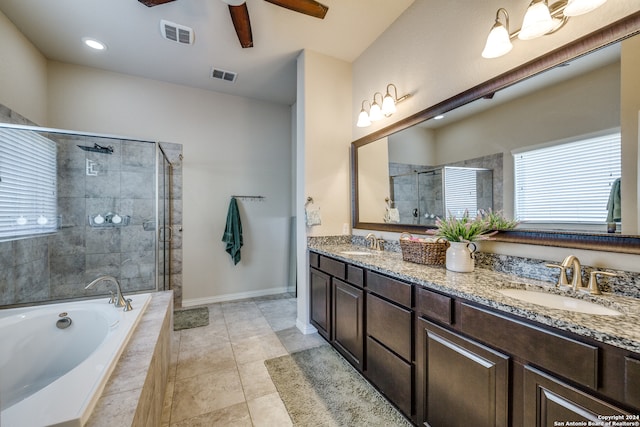 bathroom with tile patterned flooring, ceiling fan, shower with separate bathtub, and vanity