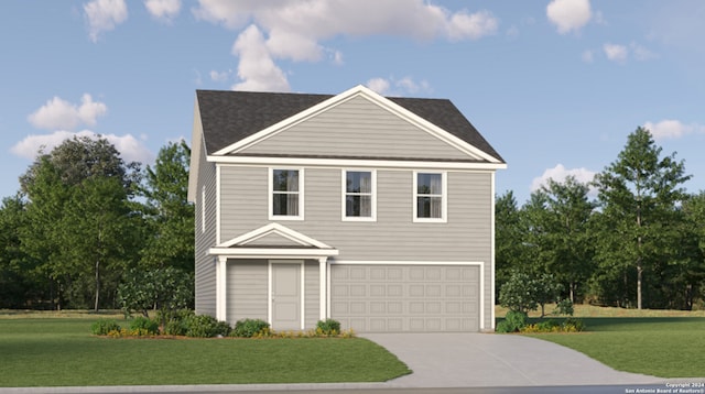 view of front of home with a front yard and a garage