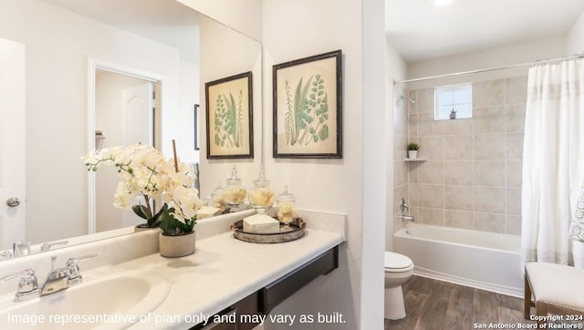 full bathroom featuring hardwood / wood-style flooring, vanity, toilet, and shower / tub combo with curtain