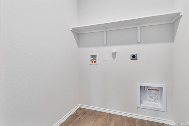 1205 Pacific Monarch, San Antonio, TX 78253 - laundry room with washer hookup, electric dryer hookup, wood finished floors, hookup for a gas dryer, and baseboards