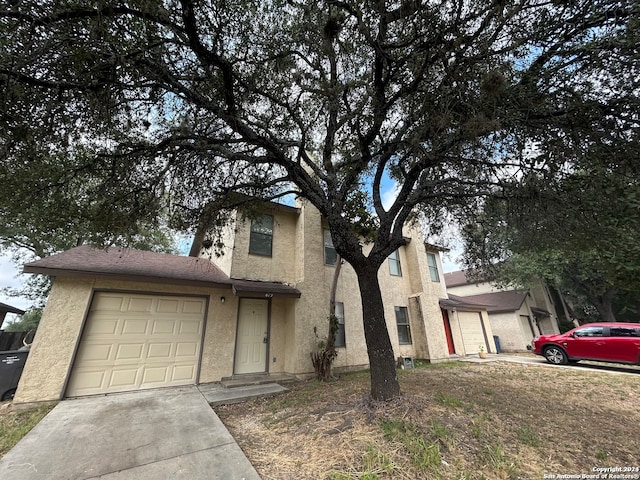 view of front of property with a garage