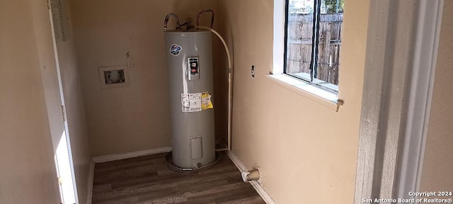 utility room with electric water heater