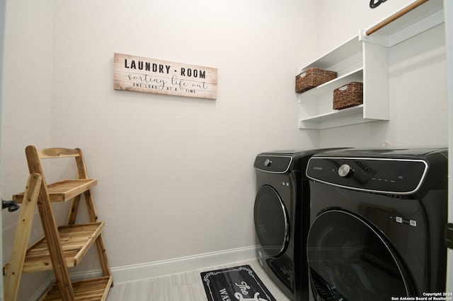 laundry room with independent washer and dryer