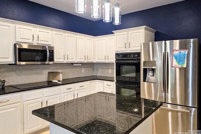 kitchen with decorative backsplash, white cabinetry, pendant lighting, and black appliances