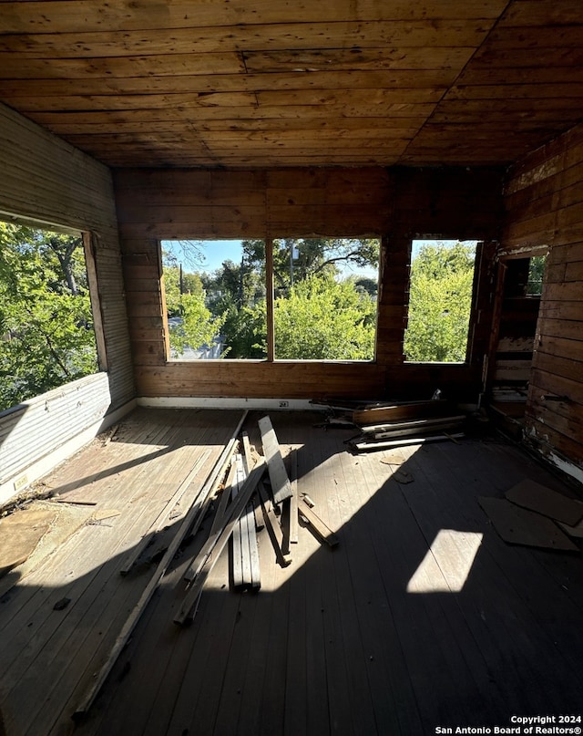 miscellaneous room with hardwood / wood-style floors and wooden ceiling