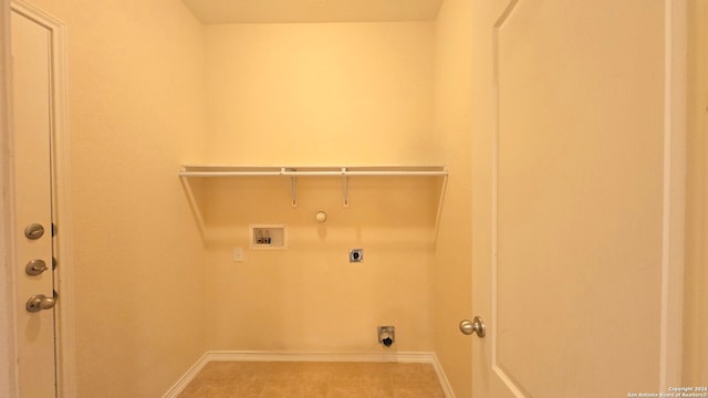 laundry room featuring electric dryer hookup, hookup for a gas dryer, light tile patterned floors, and hookup for a washing machine