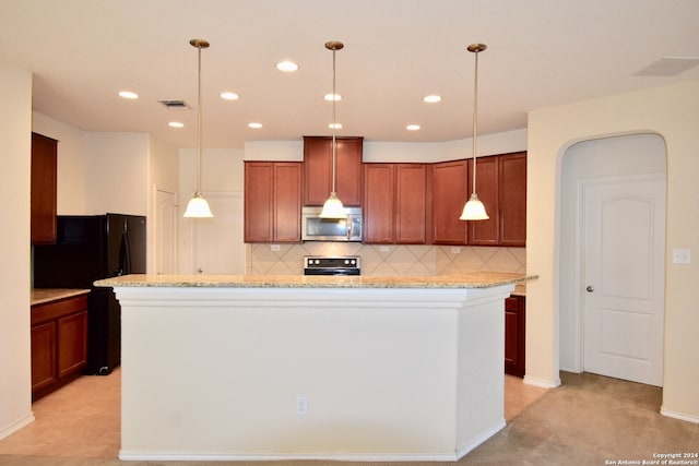 9019 Mimosa Mnr, San Antonio, TX 78245 - kitchen with stainless steel microwave, stove, a kitchen island, decorative backsplash, and recessed lighting