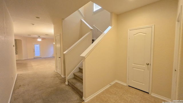 9019 Mimosa Mnr, San Antonio, TX 78245 - staircase with ceiling fan and baseboards