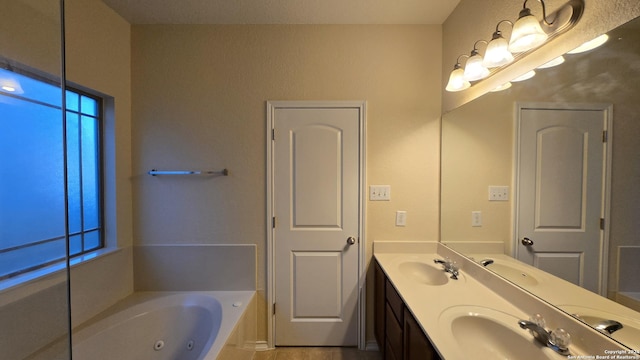 9019 Mimosa Mnr, San Antonio, TX 78245 - bathroom featuring a whirlpool tub and double vanity