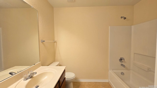 full bathroom featuring tile patterned floors, vanity, bathtub / shower combination, and toilet