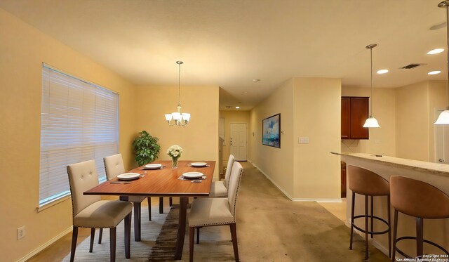 9019 Mimosa Mnr, San Antonio, TX 78245 - dining area featuring recessed lighting and a chandelier