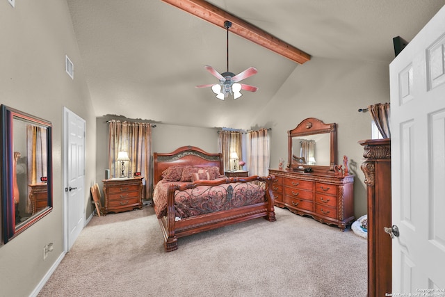 carpeted bedroom with lofted ceiling with beams and ceiling fan