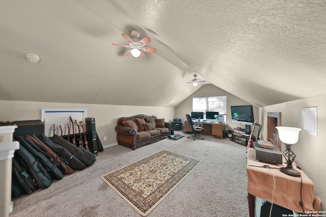 interior space featuring a textured ceiling, ceiling fan, lofted ceiling, and carpet floors