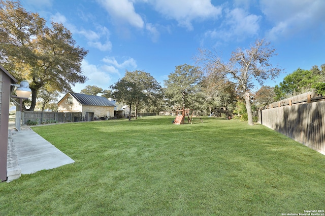 view of yard featuring a playground