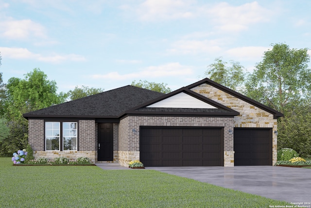 view of front of home featuring a garage and a front lawn