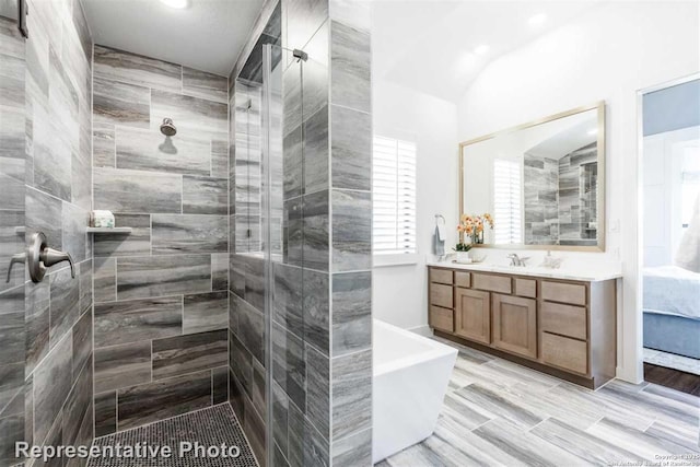 bathroom with vanity and plus walk in shower