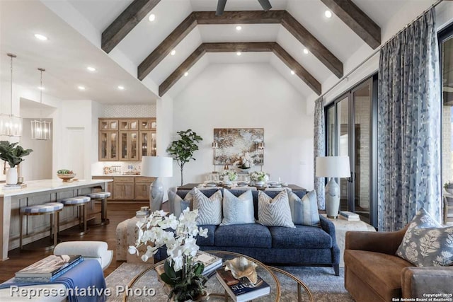 living room with high vaulted ceiling, a chandelier, dark hardwood / wood-style floors, and beamed ceiling