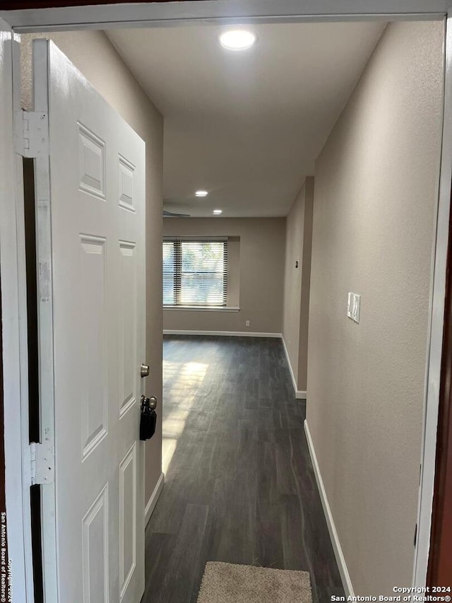 811 Thrasher Dr, San Antonio, TX 78245 - hall with baseboards, dark wood finished floors, and recessed lighting