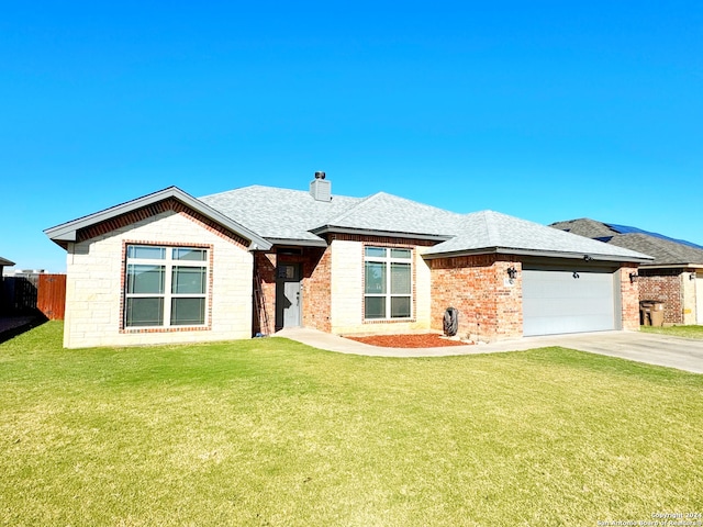 view of front facade with a front lawn and a garage