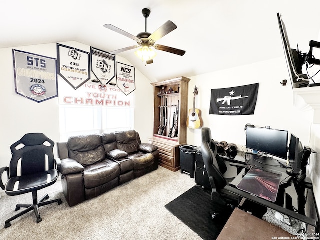 office featuring carpet flooring, vaulted ceiling, and ceiling fan