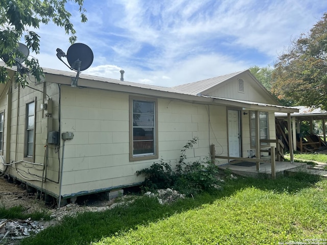 1714 Constantinople St, Castroville, TX 78009 - view of side of property with a patio and a yard