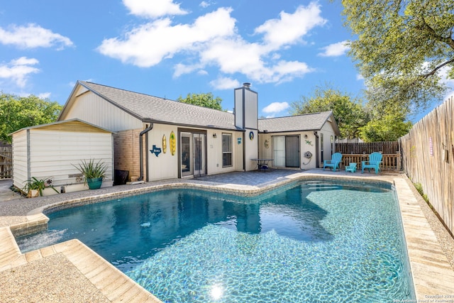 view of swimming pool featuring a patio