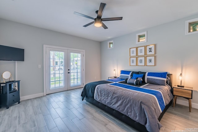 802 Piedmont Ave, San Antonio, TX 78210 - bedroom featuring access to outside, french doors, baseboards, and wood finished floors