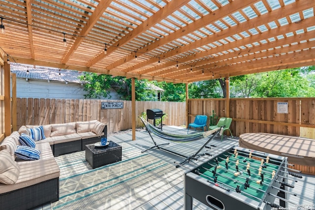 802 Piedmont Ave, San Antonio, TX 78210 - fenced backyard with an outdoor hangout area, grilling area, a pergola, and a deck