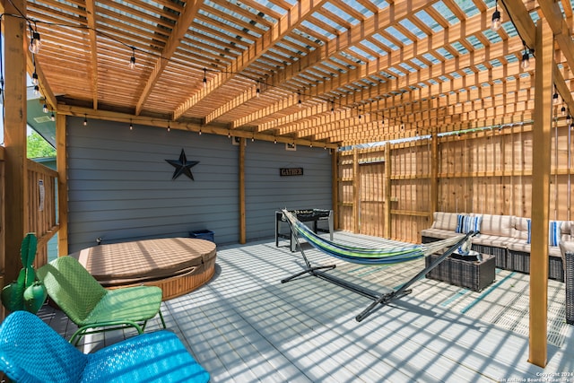 view of patio / terrace with an outdoor living space and a pergola