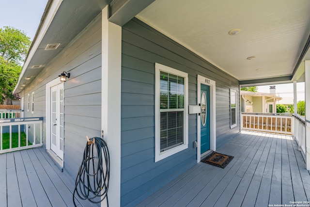 deck featuring covered porch