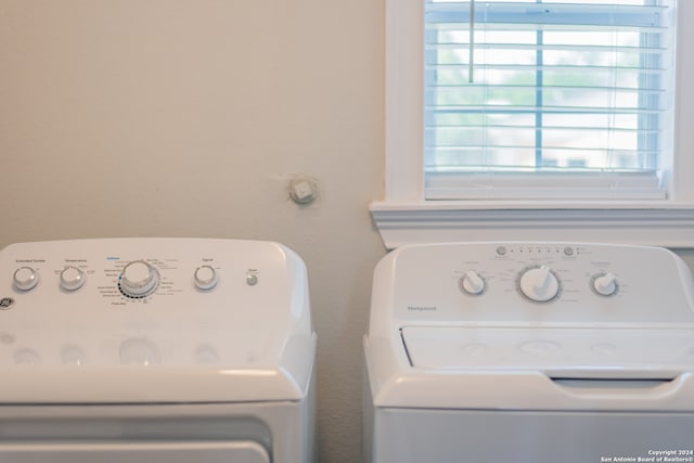 washroom featuring washer and dryer