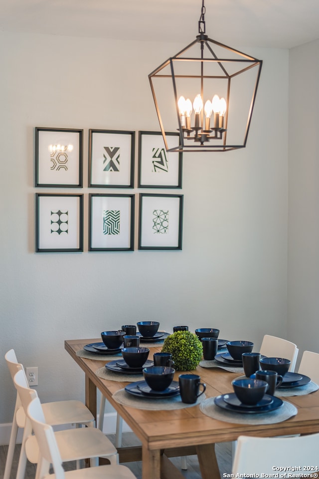 dining area featuring a chandelier