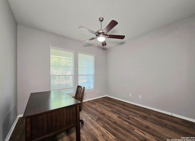 office space with ceiling fan and dark wood-type flooring