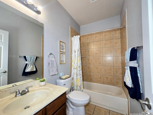 full bathroom featuring vanity, shower / bath combo, tile patterned flooring, toilet, and a textured ceiling