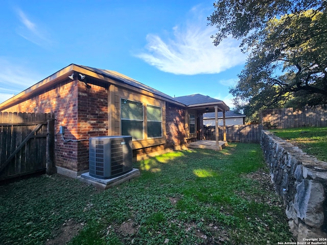 exterior space featuring central AC unit