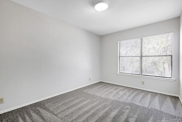 empty room with carpet floors