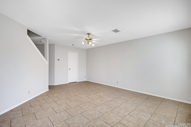 spare room featuring ceiling fan