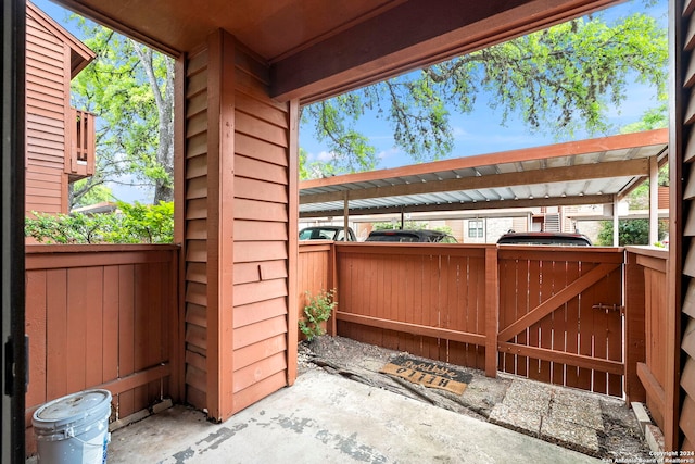 view of patio featuring a carport