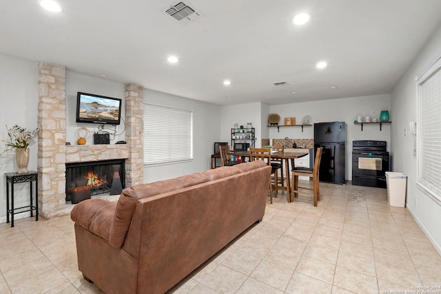 living room featuring a fireplace