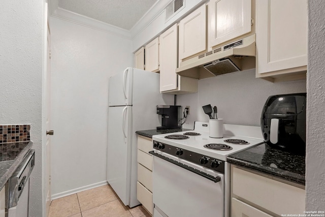 kitchen featuring light tile patterned floors, a textured ceiling, white appliances, white cabinets, and ornamental molding