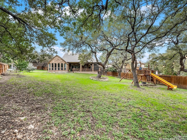 view of yard with a playground