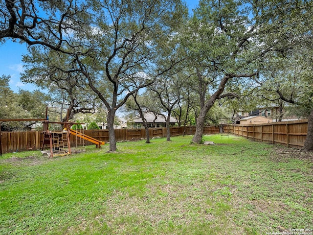 view of yard featuring a playground