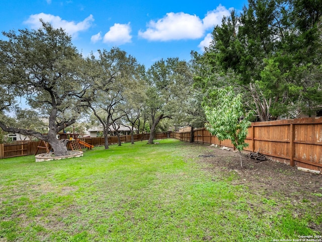 view of yard featuring a playground